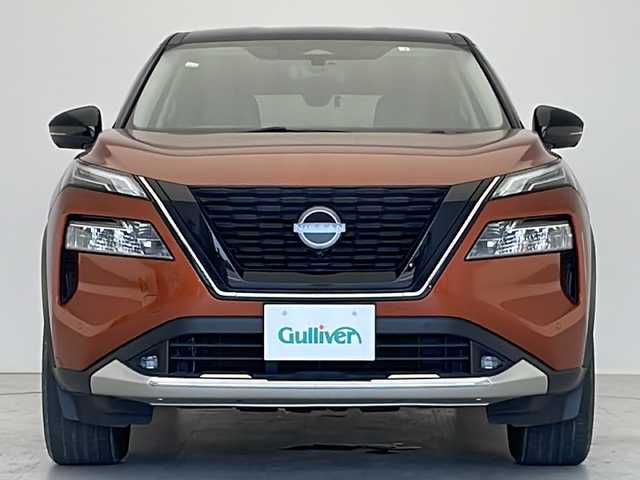 日産 エクストレイル G e－4ORCE 愛知県 2022(令4)年 0.8万km オレンジ プロパイロット/衝突軽減システム/純正１２．４型ディスプレイオーディオ（ナビあり）/全方位カメラ/レーダークルーズコントロール/シートヒーター（全席）/フルセグ/バックカメラ/電動リアゲート/パワーシート/ヘッドアップディスプレイ/コーナーセンサー/純正アルミホイール/ETC2.0/ブラインドスポットモニター/４WD/LEDヘッドライト/インテリジェントミラー/ステアリングヒーター/リアオートエアコン/ダウンヒルアシストコントロール/置くだけ充電器/ドライブレコーダー/ステアリングスイッチ/スマートキー/プッシュスタート