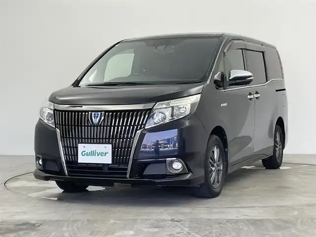 トヨタ エスクァイア ハイブリッド Gi ブラックテーラード 群馬県 2016(平28)年 8.4万km スパークリングブラックパールクリスタルシャイン 純正１０インチナビ　バックカメラ　クルーズコントロール　両側パワースライドドア　ＬＥＤ　ＡＨＢ　シートヒーター　純正１５インチＡＷ積込　ステアリングリモコン　ドライブレコーダー　ＥＴＣ　禁煙車
