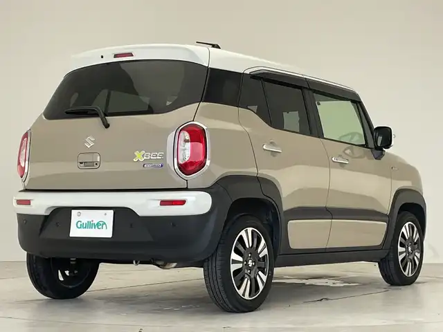 スズキ クロスビー HYBRID MZ 愛知県 2024(令6)年 1.5万km キャラバンアイボリーパールメタリック/ホワイト 2トーンルーフ ・純正SDナビ/＜フルセグ/BT/CD/DVD＞/・全方位モニター/・レーダークルーズコントロール/・パドルシフト/・ETC/・シートヒーター/・アイドリングストップ/・レーンアシスト/・横滑り防止装置/・盗難防止装置/・衝突被害軽減システム /・前後コーナーセンサー/・オートライト/・オートマチックハイビーム/・ステアリングスイッチ/・SRSエアバッグ（運転席/助手席/サイド/カーテン）/・純正１６インチアルミホイール/・LEDヘッドランプ