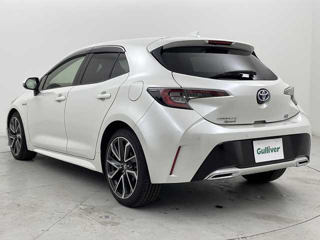 トヨタ カローラ スポーツ ハイブリッドG Z 宮城県 2019(平31)年 6.3万km ホワイトパールクリスタルシャイン 禁煙車/モデリスタエアロ（FR）/トヨタセーフティーセンス/・プリクラッシュセーフティーシステム/・レーントレーシングアシスト/・オートマチックハイビーム/・リアクロストラフィックアラート/・ロードサインアシスト/・クリアランスソナー/ブラインドスポットモニター/レーダークルーズコントロール/純正7インチナビ/・BT.CD.DVD.SD.AM.FM/バックカメラ/ビルトインETC/純正ドラレコ（F）/電動パーキングブレーキ/オートホールド/革巻きステアリング/ステアリングスイッチ/プッシュスタート/スマートキー/純正フロアマット/純正18インチアルミホイール/LEDヘッドライト/LEDフォグランプ/横滑り防止機能