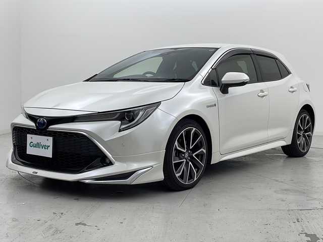 トヨタ カローラ スポーツ ハイブリッドG Z 宮城県 2019(平31)年 6.3万km ホワイトパールクリスタルシャイン 禁煙車/モデリスタエアロ（FR）/トヨタセーフティーセンス/・プリクラッシュセーフティーシステム/・レーントレーシングアシスト/・オートマチックハイビーム/・リアクロストラフィックアラート/・ロードサインアシスト/・クリアランスソナー/ブラインドスポットモニター/レーダークルーズコントロール/純正7インチナビ/・BT.CD.DVD.SD.AM.FM/バックカメラ/ビルトインETC/純正ドラレコ（F）/電動パーキングブレーキ/オートホールド/革巻きステアリング/ステアリングスイッチ/プッシュスタート/スマートキー/純正フロアマット/純正18インチアルミホイール/LEDヘッドライト/LEDフォグランプ/横滑り防止機能