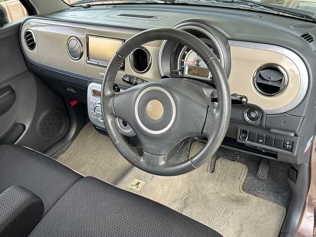 スズキ ラパン 10thアニバーサリーリミテッド 静岡県 2012(平24)年 9.5万km メロウブロンズパールメタリック ナビ/・ラジオ/フルセグTV/・CD/DVD/USB/SD/内蔵メモリ/主要装備/・ＥＴＣ　/・シートヒーター　/・純正フロアマット　/・純正アルミホイール　/・プッシュスタート　/・スマートキー　/・盗難防止装置　/・スペアキー　/・パワーステアリング　/・パワーウィンド　Ｕ/・USB入力端子　/・ハロゲンヘッドライト