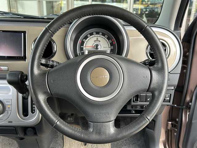 スズキ ラパン 10thアニバーサリーリミテッド 静岡県 2012(平24)年 9.5万km メロウブロンズパールメタリック ナビ/・ラジオ/フルセグTV/・CD/DVD/USB/SD/内蔵メモリ/主要装備/・ＥＴＣ　/・シートヒーター　/・純正フロアマット　/・純正アルミホイール　/・プッシュスタート　/・スマートキー　/・盗難防止装置　/・スペアキー　/・パワーステアリング　/・パワーウィンド　Ｕ/・USB入力端子　/・ハロゲンヘッドライト