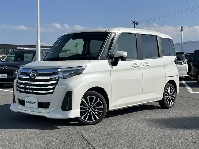 ダイハツ トール カスタムG ターボ 宮城県 2025(令7)年 0.5万km パールホワイトⅢ 純正9インチディスプレイオーディオ/(TV/BT/AppleCarPlay/AndroidAuto)/レーダークルーズコントロール/アラウンドビューモニター/前後コーナーセンサー/衝突軽減システム/レーンキープアシスト/両側パワースライドドア/後席サンシェード/LEDヘッドライト/純正15インチAW/保証書/取り扱い説明書/スペアキーX1