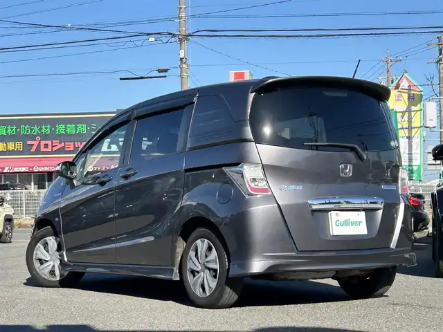 ホンダ フリード スパイク ハイブリット ジャストセレクション 愛知県 2012(平24)年 9.1万km モダンスティールM /禁煙//黒半革シート//純正フリップダウンモニター//純正ナビ//CD/DVD/BT/MSV/USB/地デジTV//バックカメラ//ドライブレコーダー//ETC//両側パワースライドドア//クルーズコントロール//LEDオートライト//革巻きステアリング//ステアリングスイッチ//横滑り防止装置//盗難防止装置//電動格納ウインカーミラー//バニティミラー//純正フロアマット//ドアバイザー//ホイールキャップ//スペアスマートキー//新車時保証書//取扱説明書