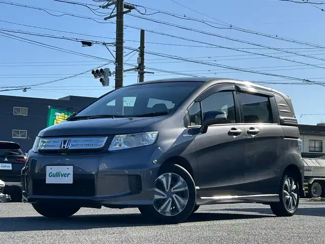 ホンダ フリード スパイク ハイブリット ジャストセレクション 愛知県 2012(平24)年 9.1万km モダンスティールM /禁煙//黒半革シート//純正フリップダウンモニター//純正ナビ//CD/DVD/BT/MSV/USB/地デジTV//バックカメラ//ドライブレコーダー//ETC//両側パワースライドドア//クルーズコントロール//LEDオートライト//革巻きステアリング//ステアリングスイッチ//横滑り防止装置//盗難防止装置//電動格納ウインカーミラー//バニティミラー//純正フロアマット//ドアバイザー//ホイールキャップ//スペアスマートキー//新車時保証書//取扱説明書