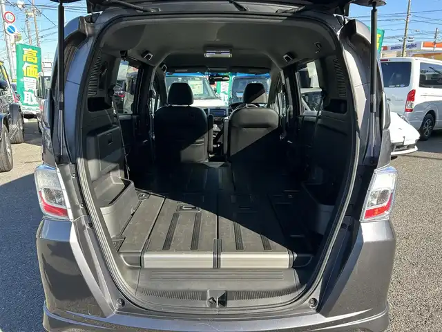 ホンダ フリード スパイク ハイブリット ジャストセレクション 愛知県 2012(平24)年 9.1万km モダンスティールM /禁煙//黒半革シート//純正フリップダウンモニター//純正ナビ//CD/DVD/BT/MSV/USB/地デジTV//バックカメラ//ドライブレコーダー//ETC//両側パワースライドドア//クルーズコントロール//LEDオートライト//革巻きステアリング//ステアリングスイッチ//横滑り防止装置//盗難防止装置//電動格納ウインカーミラー//バニティミラー//純正フロアマット//ドアバイザー//ホイールキャップ//スペアスマートキー//新車時保証書//取扱説明書