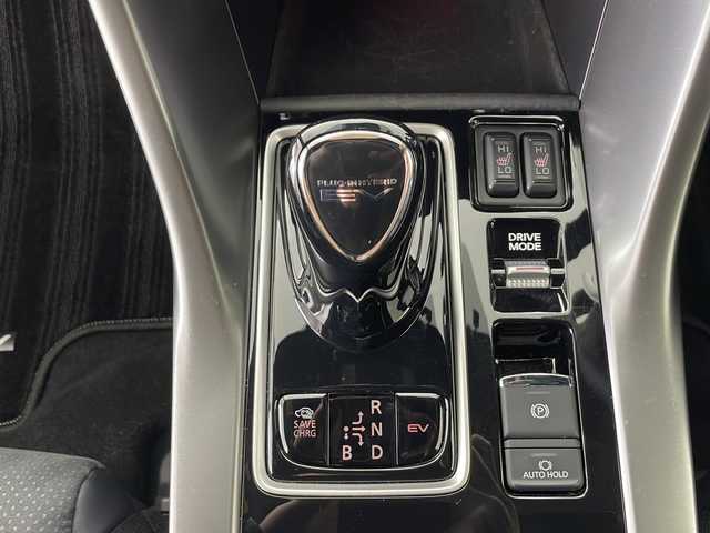 三菱 エクリプス クロス ＰＨＥＶ ブラックエディション 秋田県 2023(令5)年 1万km アメジストブラック 4WD/純正ナビ（Bluetooth/フルセグTV/USB）/マイパイロット/全方位カメラ/オートクルーズコントロール/ハーフレザーシート/D席パワーシート/前後席シートヒーター/ステアリングヒーター/LEDヘッドライト/パドルシフト/パワーバックドア/ヘッドアップディスプレイ/ETC2.0/AC100V1500W電源/衝突被害軽減ブレーキシステム[FCM]/車線逸脱警報システム［LDW］/オートマチックハイビーム［AHB］/スマートキー