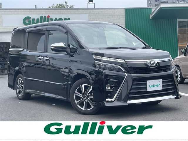 トヨタ ヴォクシー ZS 煌 島根県 2018(平30)年 5.7万km イナズマスパーキングブラックガラスフレーク 純正９インチナビ　/フルセグ　/ＤＶＤ再生　/Ｂｌｕｅｔｏｏｔｈ　/バックカメラ　/両側パワースライドドア　/ビルトインＥＴＣ/衝突軽減ブレーキ/レーンキープアシスト/クルーズコントロール　/オートハイビーム/スマートキー/プッシュスタート　/純正LEDヘッドライト　/純正フロアマット