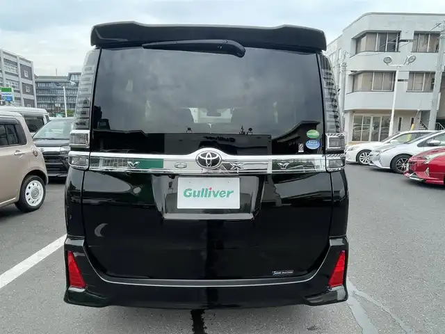 トヨタ ヴォクシー ZS 煌 島根県 2018(平30)年 5.7万km イナズマスパーキングブラックガラスフレーク 純正９インチナビ　/フルセグ　/ＤＶＤ再生　/Ｂｌｕｅｔｏｏｔｈ　/バックカメラ　/両側パワースライドドア　/ビルトインＥＴＣ/衝突軽減ブレーキ/レーンキープアシスト/クルーズコントロール　/オートハイビーム/スマートキー/プッシュスタート　/純正LEDヘッドライト　/純正フロアマット