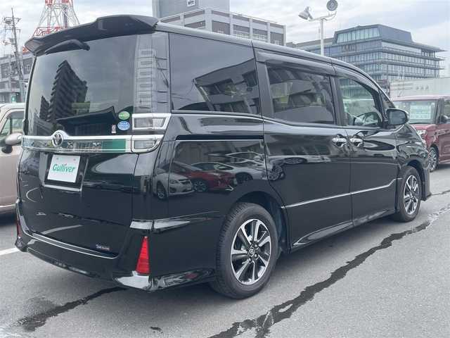 トヨタ ヴォクシー ZS 煌 島根県 2018(平30)年 5.7万km イナズマスパーキングブラックガラスフレーク 純正９インチナビ　/フルセグ　/ＤＶＤ再生　/Ｂｌｕｅｔｏｏｔｈ　/バックカメラ　/両側パワースライドドア　/ビルトインＥＴＣ/衝突軽減ブレーキ/レーンキープアシスト/クルーズコントロール　/オートハイビーム/スマートキー/プッシュスタート　/純正LEDヘッドライト　/純正フロアマット