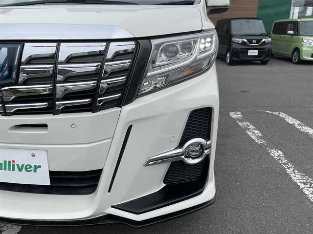 トヨタ アルファードハイブリット G 道央・札幌 2015(平27)年 7.8万km ラグジュアリーホワイトパールクリスタルシャインガラスフレーク 　4　W　D　/WALDフルエアロ/JBLプレミアムサウンド/サンルーフ/純正メーカーナビ/(AM/FM/CD/DVD/BT)/フルセグ(走行中視聴可能)/全方位モニター/パワーバックドア/両側パワースライドドア/純正フリップダウンモニター/前後ドライブレコーダー/コーナーセンサー/ステアリングスイッチ/プリクラッシュセーフティ/運転席パワーシート/オットマン/ETC/ドアバイザー/ウインカーミラー/自動防眩ミラー/オートブレーキホールド/オートライト/フォグランプ