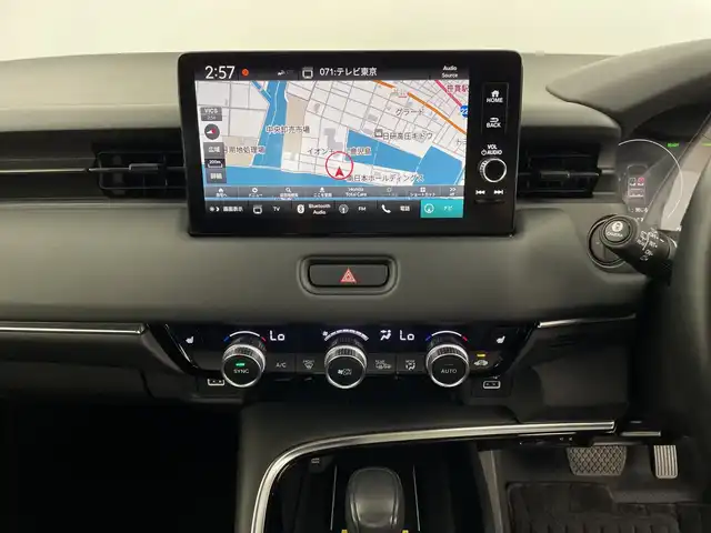 ホンダ ヴェゼル ハイブリッド e:HEV Z 鹿児島県 2021(令3)年 1.8万km ダークモカパール ホンダセンシング/衝突軽減ブレーキ/レーンキープアシスト/レーダークルーズコントロール/オートマチックハイビーム/先行車発進お知らせ機能/標識認識機能/前後コーナーセンサー/ワンオーナー/純正9インチナビ/(BT/AM/FM/Applecraplay/Androidauto/フルセグTV)/禁煙車/純正ビルトインETC2.0/パワーバックドア/ワイヤレス充電/アイドリングストップ/スペアキー/バックカメラ/全方位カメラ/純正18インチアルミホイール/純正フロアマット/純正ラゲッジマット/純正LEDヘッドライト/保証書/取扱説明書