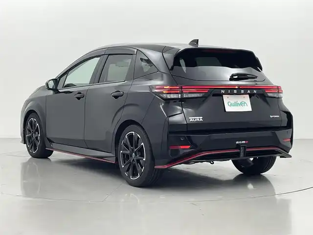 日産 オーラ ニスモ 熊本県 2022(令4)年 1.1万km スーパーブラック ワンオーナー/純正９インチナビ（ＣＤ・ＢＴ・フルセグ・ｉｐｏｄ・ＵＳＢ）/全周囲カメラ　/前方ドライブレコーダー　/ビルトインＥＴＣ　/前後クリアランスソナー　/ブラインドスポットモニター　/衝突軽減ブレーキ　/レーンキープアシスト/横滑り防止/デジタルインナーミラー/オートホールド/純正フロアマット/純正17インチAW/オートライト/オートマチックハイビーム/LEDヘッドライト/フォグランプ/スマートキー/プッシュスタート/スペアキー1本/保証書/取扱説明書