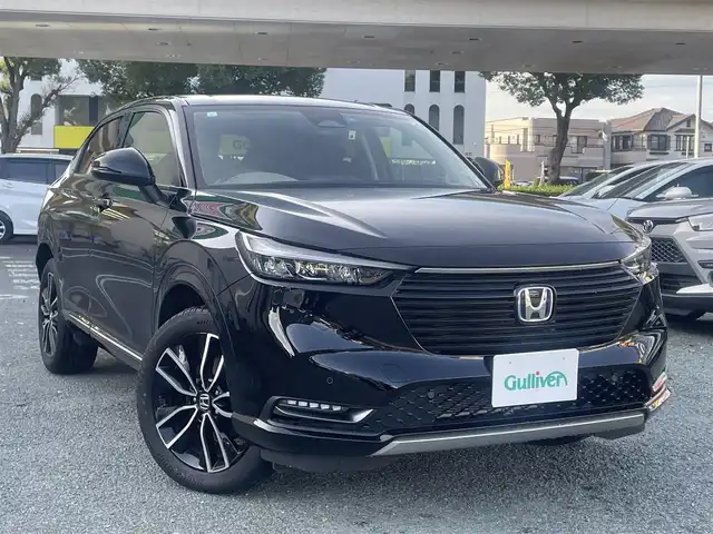 ホンダ ヴェゼル ハイブリッド e:HEV Z 熊本県 2023(令5)年 0.6万km クリスタルブラックパール ホンダセンシング/プッシュスタート/純正ナビ/（フルセグTV・BTオーディオ）/バックカメラ/ビルトインETC/前後ドライブレコーダー/純正18インチAW/レーダークルーズ/ハーフレザーシート/前席シートヒーター/パワーバックドア/パドルシフト/LEDヘッドライト/オートライト/フォグライト/前後コーナーセンサー/横滑り防止装置/ウィンカーミラー/フロアマット/新車保証書/取扱説明書/スマートスペアキー×1本