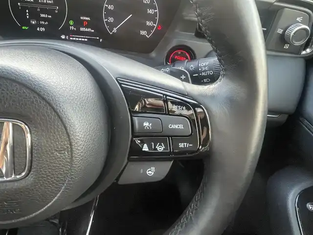 ホンダ ヴェゼル ハイブリッド e:HEV Z 熊本県 2023(令5)年 0.6万km クリスタルブラックパール ホンダセンシング/プッシュスタート/純正ナビ/（フルセグTV・BTオーディオ）/バックカメラ/ビルトインETC/前後ドライブレコーダー/純正18インチAW/レーダークルーズ/ハーフレザーシート/前席シートヒーター/パワーバックドア/パドルシフト/LEDヘッドライト/オートライト/フォグライト/前後コーナーセンサー/横滑り防止装置/ウィンカーミラー/フロアマット/新車保証書/取扱説明書/スマートスペアキー×1本