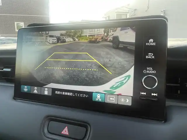 ホンダ ヴェゼル ハイブリッド e:HEV Z 熊本県 2023(令5)年 0.6万km クリスタルブラックパール ホンダセンシング/プッシュスタート/純正ナビ/（フルセグTV・BTオーディオ）/バックカメラ/ビルトインETC/前後ドライブレコーダー/純正18インチAW/レーダークルーズ/ハーフレザーシート/前席シートヒーター/パワーバックドア/パドルシフト/LEDヘッドライト/オートライト/フォグライト/前後コーナーセンサー/横滑り防止装置/ウィンカーミラー/フロアマット/新車保証書/取扱説明書/スマートスペアキー×1本