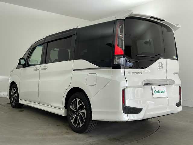 ホンダ ステップワゴン スパーダ ホンダセンシング 兵庫県 2018(平30)年 9.1万km プラチナホワイトパール ・純正9インチナビ/・CD・DVD・TV・SV・BT・USB・Apple　Carplay)/・衝突軽減ブレーキ/・アダプティブクルーズコントロール/・レーンキーピングアシスト/・標識認識機能/・先行者発進お知らせ/・ビルトインETC/・純正ドライブレコーダー/・パドルシフト/・2列目サンシェード/・ECON/・純正16インチホイール/・オートレベリングLEDヘッドライト/・プッシュスタート/・スマートキー/・スペアキー