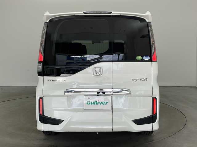 ホンダ ステップワゴン スパーダ ホンダセンシング 兵庫県 2018(平30)年 9.1万km プラチナホワイトパール ・純正9インチナビ/・CD・DVD・TV・SV・BT・USB・Apple　Carplay)/・衝突軽減ブレーキ/・アダプティブクルーズコントロール/・レーンキーピングアシスト/・標識認識機能/・先行者発進お知らせ/・ビルトインETC/・純正ドライブレコーダー/・パドルシフト/・2列目サンシェード/・ECON/・純正16インチホイール/・オートレベリングLEDヘッドライト/・プッシュスタート/・スマートキー/・スペアキー