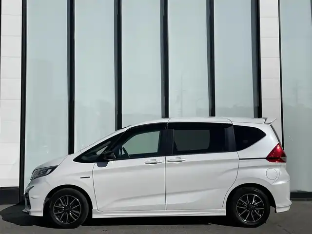 ホンダ フリード ハイブリット モデューロX ホンダセンシング 大阪府 2021(令3)年 3.2万km プラチナホワイトパール 純正ナビ /・フルセグTV BT/USB/DVD /ホンダセンシング /バックカメラ /ETC /両側パワースライドドア /純正フロアマット /ハーフレザーシート /純正15インチAW /LEDヘッド・フォグ /スペアキー/保証書・取説
