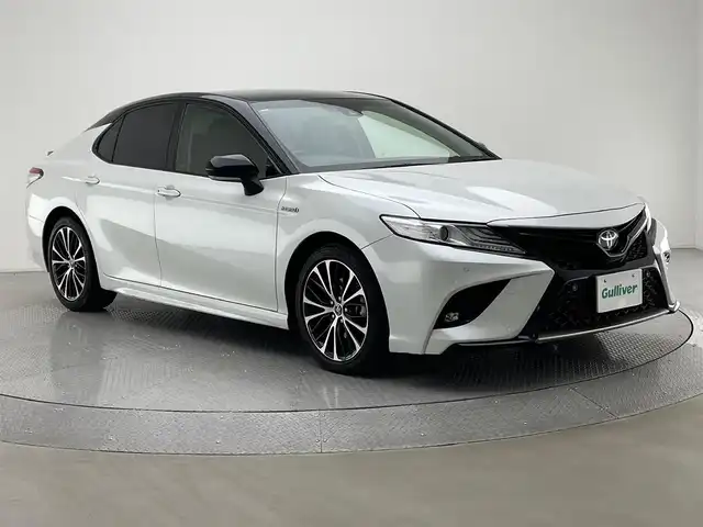 トヨタ カムリ WSレザーパッケージ 兵庫県 2019(平31)年 13万km アティチュードブラックマイカ/プラチナホワイトパールマイカ 純正SDナビ/（CD/DVD/SD/Bluetooth/フルセグTV）/バックカメラ/コーナーセンサー（前後）/アダクティブクルーズコントロール/レーンディパーチャーアラート/プリクラッシュセーフティー/ヘッドアップディスプレイ/横滑り防止装置/盗難防止装置/カーテンエアバッグ/MTモード付AT/レザーシート/パワーシート（D/N席）/シートヒーター（D/N席）/パドルシフト/LEDヘッドライト/LEDフォグランプ/オートライト/オートマチックハイビーム/ビルトインETC2.0/TVキット/AC100Vコンセント/純正18インチアルミホイール/純正フロアマット/スマートキー/スペアキー1本