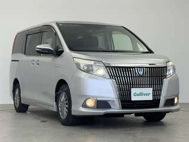 トヨタ エスクァイア ハイブリッド Xi 愛知県 2015(平27)年 8万km シルバーM 純正ナビ/（フルセグ／ＢＴ／ＣＤ／ＤＶＤ）/バックカメラ/後席モニター/両側パワースライドドア/前席シートヒーター/サンバイザー/横滑り防止装置/純正ＡＷ/ドライブレコーダー/ＥＴＣ/オートライト