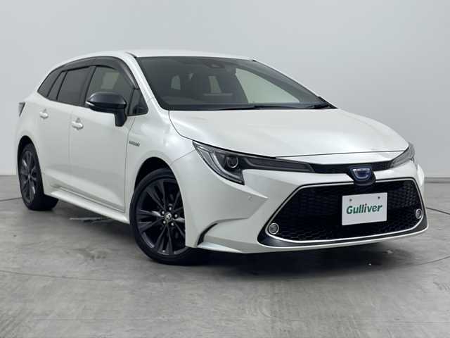 トヨタ カローラツーリング ハイブリッド ダブルバイビー 三重県 2020(令2)年 4.4万km ホワイトパールクリスタルシャイン 禁煙車　/純正ディスプレイオーディオナビ　/バックカメラ　/ETC/レーダークルーズコントロール　/コーナーセンサー　/オートライト　/オートハイビーム　/衝突軽減　/レーンキープアシスト　/ＢＳＭ　/エンジンスタートボタン