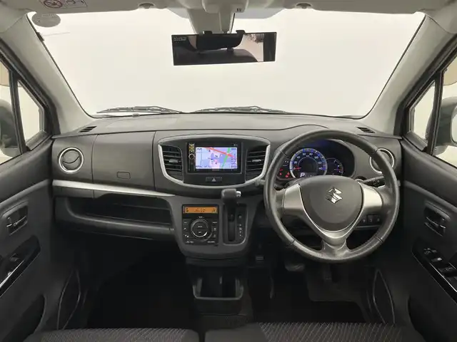 スズキ ワゴンＲ 20周年記念車 富山県 2014(平26)年 1.2万km パールホワイト 社外ナビ（AM/FM/DVD/ワンセグ）/D席シートヒーター/衝突被害軽減システム/横滑り防止装置/アイドリングストップ/オートキセノンライト/純正アルミホイール/社外フロアマット/革巻きステアリング/ステアリングスイッチ/スマートキー/スペアキー