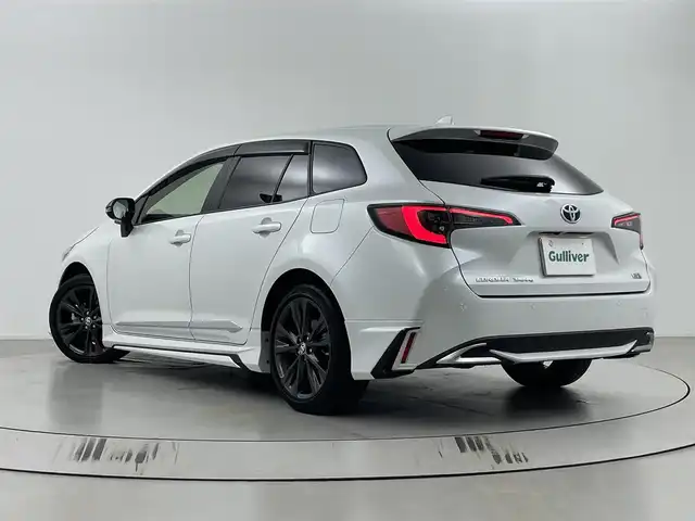 トヨタ カローラツーリング ハイブリッド ダブルバイビー 埼玉県 2023(令5)年 2.9万km プラチナホワイトパールマイカ モデリスタエアロ　/純正ナビ　/　(フルセグ/AM/FM/Bluetooth)　/ビルトインＥＴＣ２．０　/ステアリングヒーター　/トヨタセーフティセンス　/レーンディパーチャーアラート　/ブラインドスポットモニター　/プリクラッシュセーフティ/プロアクティブドライビングアシスト/リヤクロストラフィックアラート/パーキングサポートブレーキ/安心降車アシスト機能/ロードサインアシスト