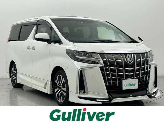 トヨタ アルファード S Cパッケージ 熊本県 2020(令2)年 6.5万km ホワイトパールクリスタルシャイン 禁煙車/純正ナビ/・フルセグTV/・Bluetooth/・FM/AM/・CD/DVD/・SD/・USB/TRDエアロ/純正フリップダウンモニター/両側パワースライドドア/デジタルインナーミラー/Wムーンルーフ/レーダークルーズコントロール/パワーバックドア/ブラインドスポットモニター/レーンキープアシスト/プリクラッシュブレーキ/駐車時支援パーキングサポートシステム/リアクロストラフィックアラート/前席ヒートシーター　/前席エアシート/パワーシート/メモリーシート/ステアリングヒーター/パワーバックドア/オットマン/純正フロアマット/純正１８インチAW/オートライト/オートマチックハイビーム/3眼LEDヘッドライト/フォグランプ/スマートキー/プッシュスタート/スペアキー1本/保証書/取扱説明書