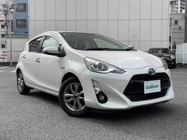 トヨタ アクア S スタイルブラック 神奈川県 2016(平28)年 5.1万km ライムホワイトパールクリスタルシャイン 衝突軽減ブレーキシステム/レーンキープアシスト/純正ＳＤナビ/・Bluetooth/AUX/CD/バックカメラ　/ビルトインＥＴＣ　/ＢＲＩＤＥＳＴＯＮＥ製ＢＡＬＭＩＮＵＭホイール　/オートライト/ＬＥＤヘッドライト　/フォグランプ　/プッシュスタート/スマートキー　/Wエアバッグ/保証書/スペアキー