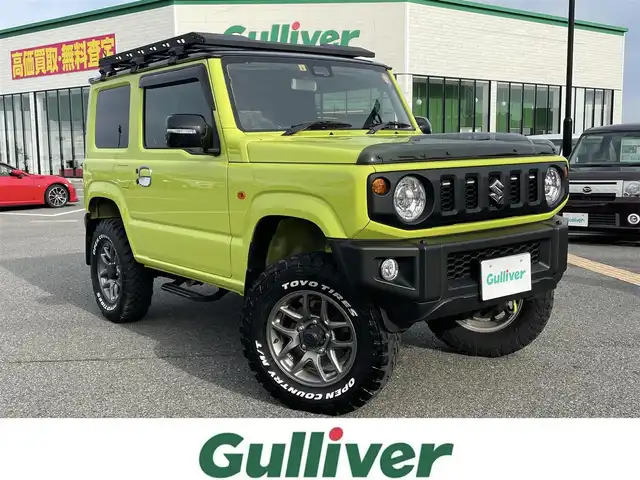 スズキ ジムニー XC 鳥取県 2023(令5)年 2.3万km キネティックイエロー/ブラック ４WD　ターボ/ツートンカラー/ルーフブラック/ワンオーナー/社外８型ナビ／ＴＶ／ＤＶＤ／ＣＤ／ＢＴ/フロント／バックカメラ/MotorFarm３インチリフトＵＰキット/・FARMスプリング/アブショーバー/・ステンレスラテラルロット/・キャスター＾補正ブッシュ/・50ｍｍ延長ブレーキホース/社外２本出しマフラー/カロッツエリアスピーカー/ツイーター/TOYOオープンカントリー/ルーフラック/リヤラダー/サイドステップ/ボンネット/バックドアダンパー交換/ボンネットバイザー/グリル内LEDデイライト/（通常時：ホワイト　ライト点灯時：オレンジ）/C.Llinkシリコンインテークホース/社外アルミスタットレスセット/（タイヤ残溝　９部山）/３Driveスロットルコントロール/衝突軽減ブレーキ/クルーズコントロール/ＬＥＤヘットライト/プッシュスタート/スマートキーｘ２/純正パーツ積込