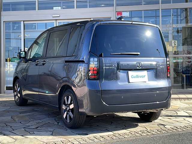 ホンダ フリード ハイブリット e:HEV AIR EX 静岡県 2025(令7)年 0.1千km メテオロイドグレーメタリック 純正9インチナビ/・AM/FM/・フルセグTV/・Apple Car Play/・Android Auto/・Bluetooth/ホンダセンシング/●衝突軽減ブレーキ（CMBS）/●先行車発進お知らせ機能/●歩行者事故低減ステアリング/●路外逸脱抑制機能/●標識認識機能/●渋滞追従機能付アダプティブクルーズコントロール/●車線維持支援システム/●トラフィックジャムアシスト（渋滞運転支援機能）/●誤発進抑制機能/●後方誤発進抑制機能/●近距離衝突軽減ブレーキ/●急アクセル抑制機能/●パーキングセンサーシステム/●オートハイビーム●/主要装備/・バックカメラ/・クリアランスソナー/・両側パワスラ/・ビルトインＥＴＣ/・電動パーキング/・リアクーラー/・サイドカーテンエアバッグ/・前席シートヒーター/・純正フロアマット/・純正アルミ