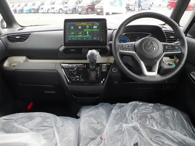 三菱 デリカミニ T プレミアム 千葉県 2025(令7)年 0.1万km未満 緑Ⅱ T　PREMIUM　4WD　9型ディスプレイオーディオ（121/330）CHAMONIXパッケージ（179190）/e-Assist/・衝突被害軽減ブレーキシステム（FCM）/・車線逸脱警報システム（LDW）/・誤発進抑制機能（前進＆後退時）（UMS）/・レーダークルーズコントロールシステム（ACC）/・オートマチックハイビーム[AHB]/ハンズフリー両側パワースライドドア/デジタルインナーミラー/ハーフレザーシート/前席シートヒーター/ディスプレイオーディオ/【Bluetooth接続】/【Apple CarPlay　Android Auto対応】/マルチアラウンドモニター/アイドリングストップ/ステアリングスイッチ/ステアリングヒーター/革巻きステアリング/パドルシフト/LEDヘッドライト/フォグライト/コーナーセンサー/純正15インチアルミホイル/サイド/カーテンエアバッグ/キーレスオペレーションシステム