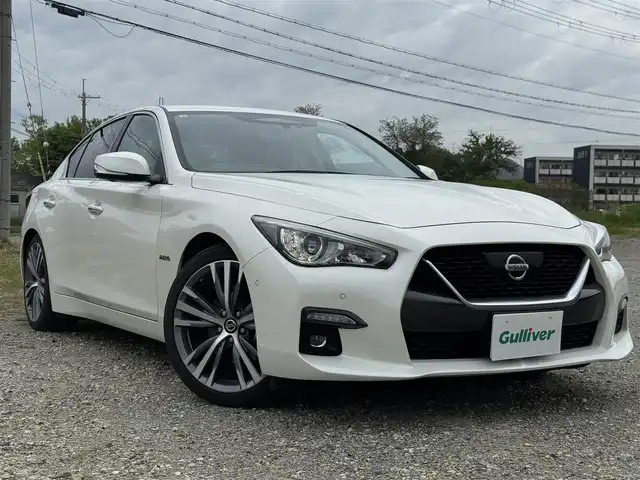 日産 スカイライン ハイブリッド GT タイプSP 兵庫県 2020(令2)年 6.3万km ブリリアントホワイトパール 純正ナビ/サンルーフ/全方位モニター/フルセグTV/Bluetooth接続可/ビルトインETC2.0/ドライブレコーダー/レーダークルーズコントロール/黒革シート/シートヒーター/パワーシート/リバース連動ドアミラー/純正19インチAW