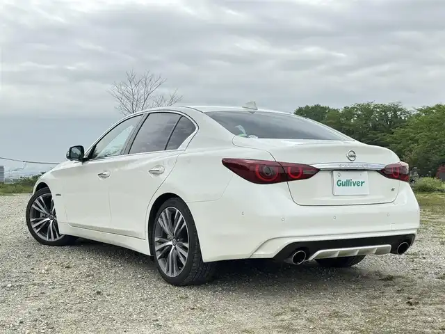 日産 スカイライン ハイブリッド GT タイプSP 兵庫県 2020(令2)年 6.3万km ブリリアントホワイトパール 純正ナビ/サンルーフ/全方位モニター/フルセグTV/Bluetooth接続可/ビルトインETC2.0/ドライブレコーダー/レーダークルーズコントロール/黒革シート/シートヒーター/パワーシート/リバース連動ドアミラー/純正19インチAW