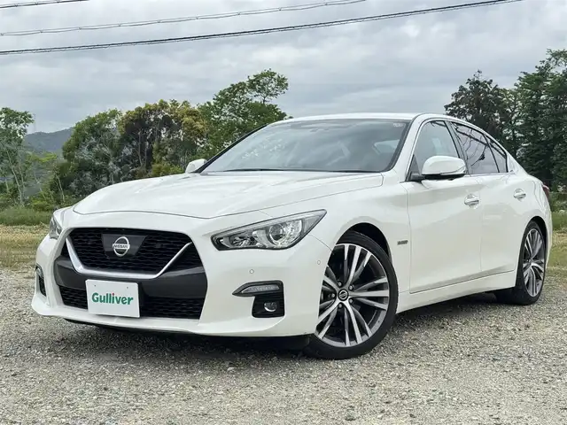 日産 スカイライン ハイブリッド GT タイプSP 兵庫県 2020(令2)年 6.3万km ブリリアントホワイトパール 純正ナビ/サンルーフ/全方位モニター/フルセグTV/Bluetooth接続可/ビルトインETC2.0/ドライブレコーダー/レーダークルーズコントロール/黒革シート/シートヒーター/パワーシート/リバース連動ドアミラー/純正19インチAW