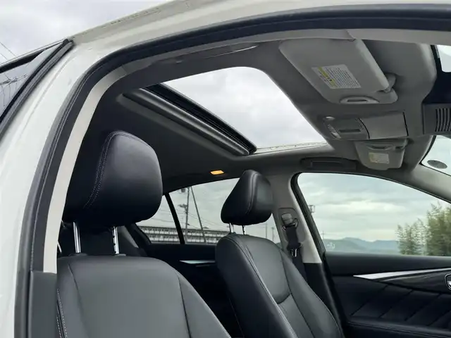 日産 スカイライン ハイブリッド GT タイプSP 兵庫県 2020(令2)年 6.3万km ブリリアントホワイトパール 純正ナビ/サンルーフ/全方位モニター/フルセグTV/Bluetooth接続可/ビルトインETC2.0/ドライブレコーダー/レーダークルーズコントロール/黒革シート/シートヒーター/パワーシート/リバース連動ドアミラー/純正19インチAW
