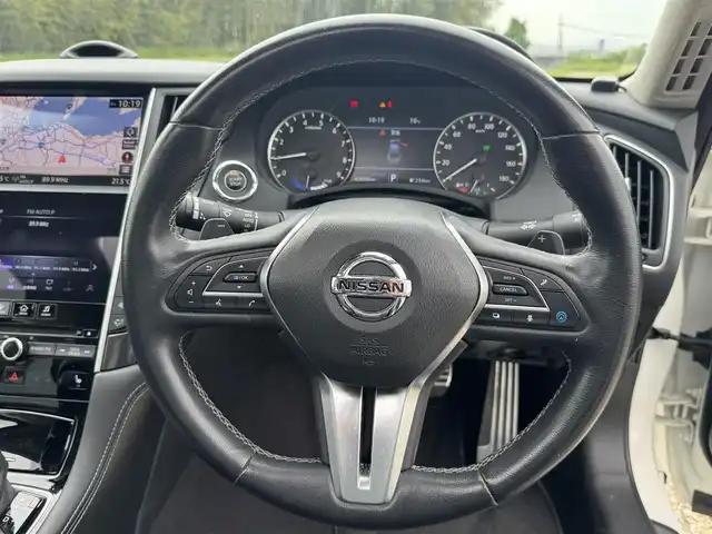 日産 スカイライン ハイブリッド GT タイプSP 兵庫県 2020(令2)年 6.3万km ブリリアントホワイトパール 純正ナビ/サンルーフ/全方位モニター/フルセグTV/Bluetooth接続可/ビルトインETC2.0/ドライブレコーダー/レーダークルーズコントロール/黒革シート/シートヒーター/パワーシート/リバース連動ドアミラー/純正19インチAW