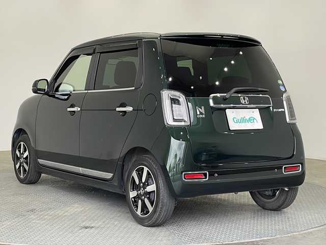 ホンダ Ｎ ＯＮＥ プレミアム 栃木県 2021(令3)年 6万km ブリティッシュグリーンP ワンオーナー/禁煙車/純正ナビ/(CD/DVD/フルセグTV/Bluetooth/MSV/SD/USB)/バックカメラ/ホンダセンシング/・アダプティブクルーズコントロール/・衝突軽減ブレーキ/・車線維持支援システム/コーナーセンサー/ビルトインETC/前方ドラレコ/ハーフレザー/シートヒーター/オートライト/LEDヘッドライト/横滑り防止装置/フォグランプ/スマートキー/プッシュスタート/ステアリングスイッチ/革巻きステアリング/ウィンカーミラー/電動格納ミラー/純正14インチアルミホイール/純正フロアマット