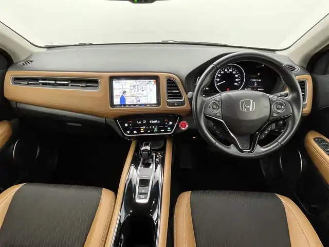 ホンダ ヴェゼル ハイブリッド Z ホンダセンシング 熊本県 2018(平30)年 6.9万km クリスタルブラックパール 禁煙車　/純正j9インチナビ（ＣＤ・ＤＶＤ・フルセグ・ＢＴ・ＳＤ）/バックカメラ　/純正前方ドライブレコーダー　/ビルトインＥＴＣ　/ホンダセンシング/・衝突軽減ブレーキ/・レーンキープアシスト/・アダブティブクルーズコントロール/横滑り防止/前席シートヒーター/ブラウンコンビシート/パドルシフト/純正フロアマット/純正１７インチAW/オートライト/LEDヘッドライト/フォグライト/スマートキー/プッシュスタート/スペアキー1本/保証書/取扱説明書