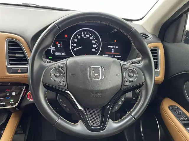 ホンダ ヴェゼル ハイブリッド Z ホンダセンシング 熊本県 2018(平30)年 6.9万km クリスタルブラックパール 禁煙車　/純正j9インチナビ（ＣＤ・ＤＶＤ・フルセグ・ＢＴ・ＳＤ）/バックカメラ　/純正前方ドライブレコーダー　/ビルトインＥＴＣ　/ホンダセンシング/・衝突軽減ブレーキ/・レーンキープアシスト/・アダブティブクルーズコントロール/横滑り防止/前席シートヒーター/ブラウンコンビシート/パドルシフト/純正フロアマット/純正１７インチAW/オートライト/LEDヘッドライト/フォグライト/スマートキー/プッシュスタート/スペアキー1本/保証書/取扱説明書