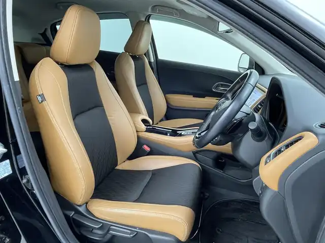 ホンダ ヴェゼル ハイブリッド Z ホンダセンシング 熊本県 2018(平30)年 6.9万km クリスタルブラックパール 禁煙車　/純正j9インチナビ（ＣＤ・ＤＶＤ・フルセグ・ＢＴ・ＳＤ）/バックカメラ　/純正前方ドライブレコーダー　/ビルトインＥＴＣ　/ホンダセンシング/・衝突軽減ブレーキ/・レーンキープアシスト/・アダブティブクルーズコントロール/横滑り防止/前席シートヒーター/ブラウンコンビシート/パドルシフト/純正フロアマット/純正１７インチAW/オートライト/LEDヘッドライト/フォグライト/スマートキー/プッシュスタート/スペアキー1本/保証書/取扱説明書