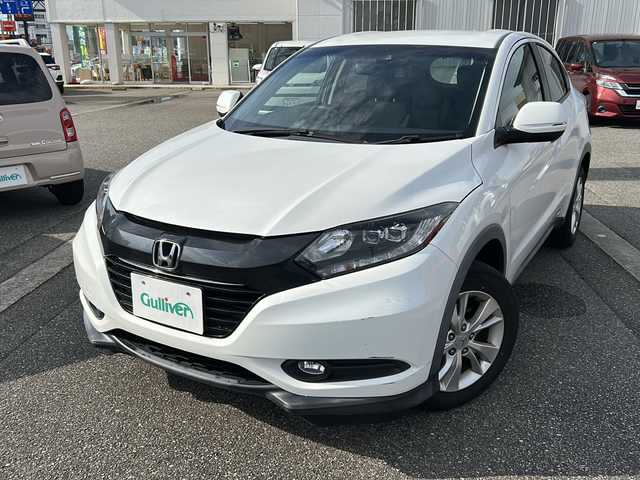 ホンダ ヴェゼル 富山県 2016(平28)年 8.5万km ホワイトオーキッドパール スマートキー/社外メモリーナビ（NH788P)/DVD/BT/フルセグTV/バックカメラ/ETC/衝突安全ブレーキ/車線逸脱警報/レーダークルコン/オートブレーキホールド/電動格納ウィンカーミラー/ステアリングスイッチ/ドライブレコーダー/純正１６インチAW/保証書・取説・ナビ取説/スペアキー（スマートキー）