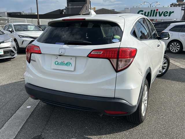 ホンダ ヴェゼル 富山県 2016(平28)年 8.5万km ホワイトオーキッドパール スマートキー/社外メモリーナビ（NH788P)/DVD/BT/フルセグTV/バックカメラ/ETC/衝突安全ブレーキ/車線逸脱警報/レーダークルコン/オートブレーキホールド/電動格納ウィンカーミラー/ステアリングスイッチ/ドライブレコーダー/純正１６インチAW/保証書・取説・ナビ取説/スペアキー（スマートキー）