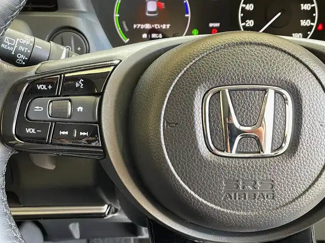 ホンダ ヴェゼル ハイブリッド e:HEV Z 岩手県 2023(令5)年 0.8万km プレミアムサンライトホワイトパール ４WD/ハンズフリーアクセスパワーテールゲート/ホンダセンシング/衝突軽減ブレーキ/踏み間違い衝突軽減システム/アダプティブクルーズコントロール/渋滞運転支援機能/レーンキープアシスト/アダプティブドライビングビーム/パーキングセンサー/ヒルディセントコントロール/減速セレクター/横滑り防止装置/オートブレーキホールド/シートヒーター/ステアリングヒーター/PTCヒーター/Pioneerディスプレイオーディオ/AppleCarPlay、AndroidAuto/バックカメラ/ETC/ドライブレコーダー/LEDヘッドライト/LEDフォグライト/純正18インチアルミホイール