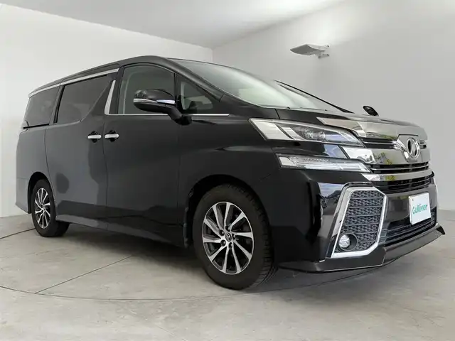 トヨタ ヴェルファイア Z 愛知県 2015(平27)年 7.3万km ブラック トヨタセーフティーセンス/クルーズコントロール/純正ナビ/・Bluetooth/・フルセグTV/・AM/FM/ＡＬＰＩＮＥフリップダウンモニター/片側パワースライドドア/革巻きステアリング/ステアリングリモコン/前後ドラレコ/電子パーキング/ブレーキホールド/ビルトインETC/三列シート/8人乗り/バックカメラ/フォグランプ/AUTOライト