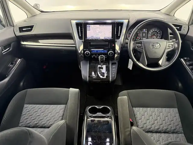 トヨタ ヴェルファイア Z 愛知県 2015(平27)年 7.3万km ブラック トヨタセーフティーセンス/クルーズコントロール/純正ナビ/・Bluetooth/・フルセグTV/・AM/FM/ＡＬＰＩＮＥフリップダウンモニター/片側パワースライドドア/革巻きステアリング/ステアリングリモコン/前後ドラレコ/電子パーキング/ブレーキホールド/ビルトインETC/三列シート/8人乗り/バックカメラ/フォグランプ/AUTOライト