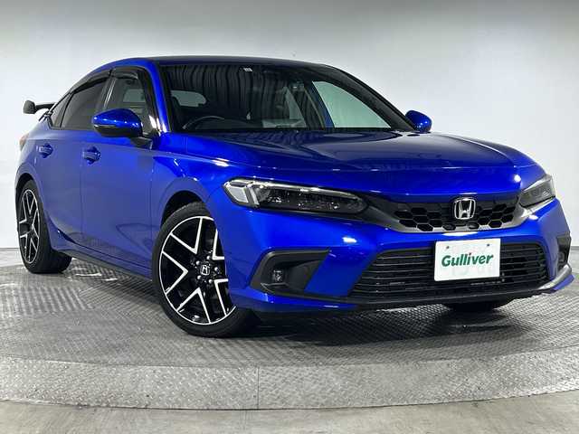 ホンダ シビック LX 神奈川県 2021(令3)年 3万km プレミアムクリスタルブルークリスタル ホンダコネクナビトディスプレイ【MY21ADA】/ナビゲーションシステム/フルセグ　Bluetooth USB　AM　FM　WI-FI/ホンダセンシング/衝突軽減ブレーキ/誤発進抑制機能/後方誤発進抑制機能/近距離衝突軽減ブレーキ/歩行者事故低減ステアリング/路外逸脱抑制機能/渋滞追従機能付アダブティブクルーズコントロール/車線維持支援システム/トラフィックジャムアシスト/先行車発進お知らせ機能/標識認識機能/オートハイビーム/パーキングセンサーシステム/ブラインドスポットインフォメーション/後退出庫サポート/プライムスムース合皮/ファブリックコンビシート/前席シートヒーター/革巻きステアリング/SOSコール/純正ビルトインETC2.0/自動防眩ミラー/社外前方ドライブレコーダー/プッシュスタート/スマートキー/純正サイド/リアスポイラー/純正18インチアルミホイール/無限ドアバイザー/LEDヘッドライト/オートライト/フロントフォグランプ