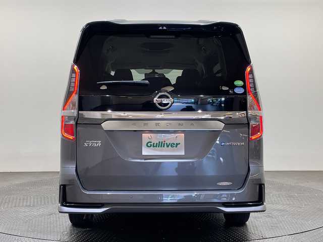 日産 セレナ e－パワー ハイウェイスター V 愛媛県 2021(令3)年 2.1万km ダークメタルグレー １０型ナビ/フルセグ／Ｂｌｕｅｔｏｏｔｈ／ＵＳＢ/全方位カメラ/１１型後席モニター/ＥＴＣ/前方ドライブレコーダ－/レーダークルーズコントロール/両側パワースライドドア/ブラインドスポットモニター/前後コーナーセンサー/レーンキープアシスト/衝突軽減ブレーキ/デジタルインナーミラー